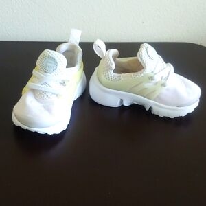 Nike, toddler size 6c, white sneaker.